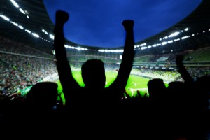 Football, soccer fans support their team and celebrate
